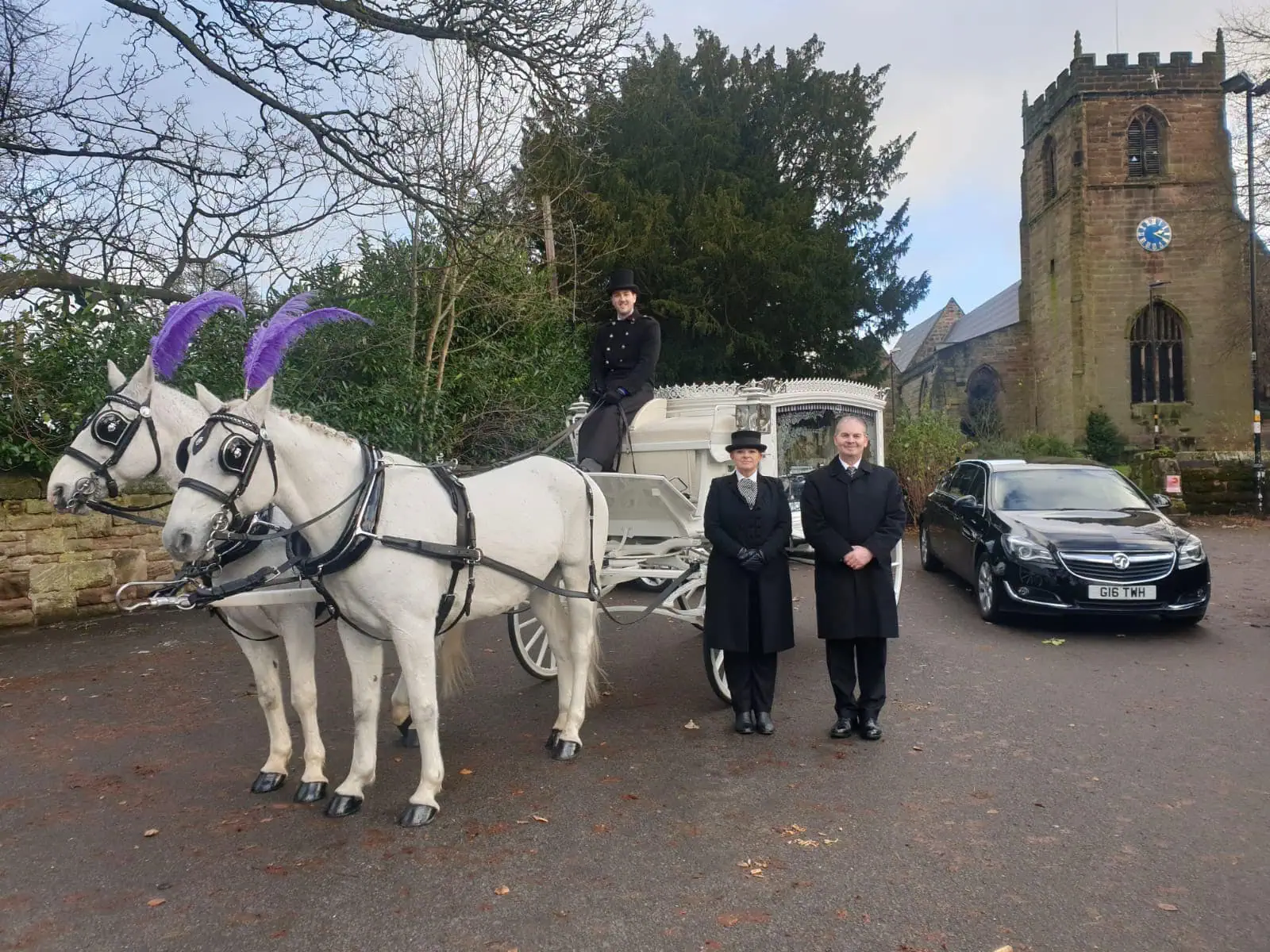 white horse drawn hearse as supplied by Sincerity Funerals Funeral Director Wolverhampton